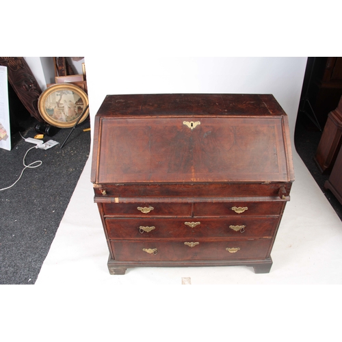 1213 - A GOOD WILLIAM AND MARY HERRING-BANDED AND BURR WALNUT BUREAU having angled hinged fall revealing a ... 