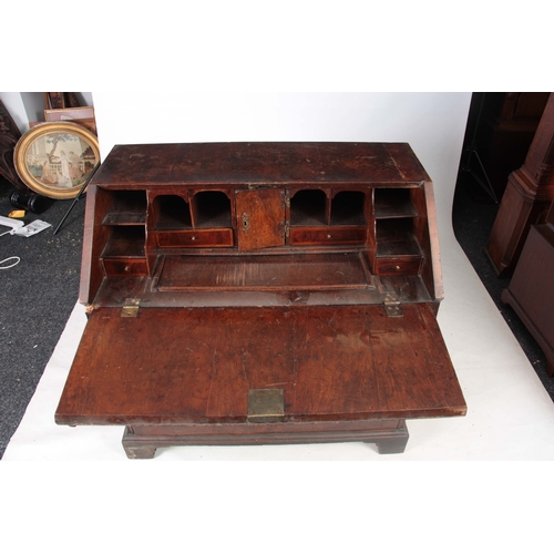 1213 - A GOOD WILLIAM AND MARY HERRING-BANDED AND BURR WALNUT BUREAU having angled hinged fall revealing a ... 