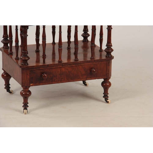 1214 - A MID 19th CENTURY BURR WALNUT CANTERBURY with turned sections above a long drawer with canted corne... 