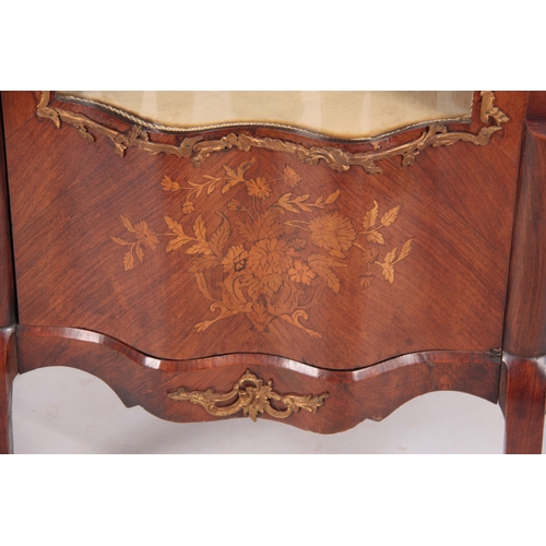 1215 - A 19TH CENTURY FRENCH ROSEWOOD, WALNUT AND MARQUETRY INLAID DOUBLE SERPENTINE FRONTED VITRINE WITH L... 