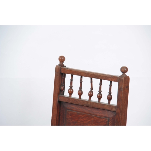 1218 - A 19TH CENTURY OAK LIBRARY STEPS / CHAIR with panelled back and turned front legs.