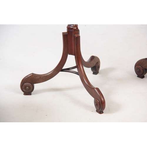 1233 - A PAIR OF GEORGE III MAHOGANY HEPPLEWHITE STYLE TORCHERES / CANDLESTANDS of shaped design standing o... 