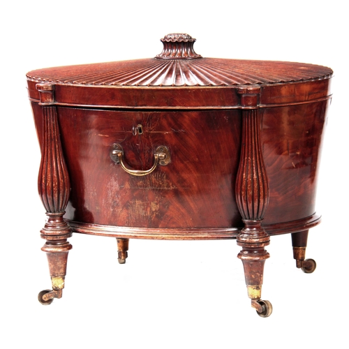 1237 - A FINE GEORGE III HEPPLEWHITE MAHOGANY OVAL CELLERETTE / WINE COOLER OF GENEROUS SIZE the slightly r... 