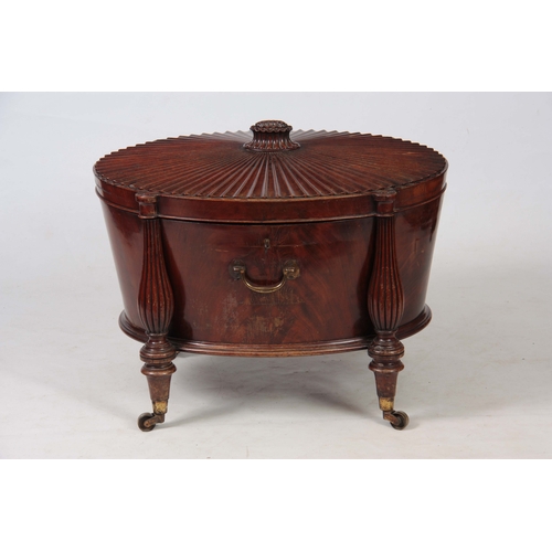 1237 - A FINE GEORGE III HEPPLEWHITE MAHOGANY OVAL CELLERETTE / WINE COOLER OF GENEROUS SIZE the slightly r... 