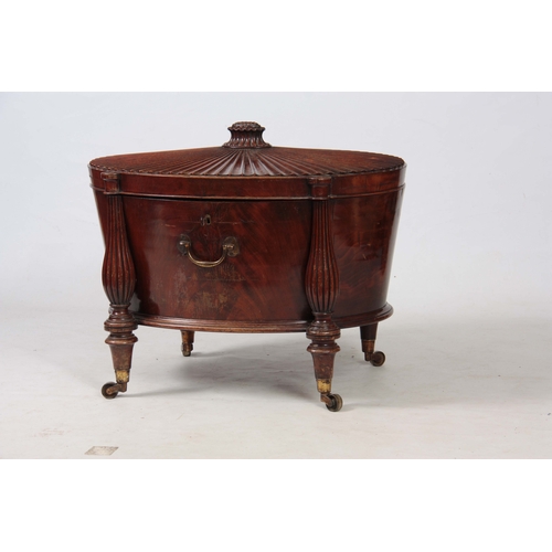 1237 - A FINE GEORGE III HEPPLEWHITE MAHOGANY OVAL CELLERETTE / WINE COOLER OF GENEROUS SIZE the slightly r... 