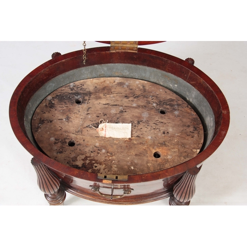 1237 - A FINE GEORGE III HEPPLEWHITE MAHOGANY OVAL CELLERETTE / WINE COOLER OF GENEROUS SIZE the slightly r... 