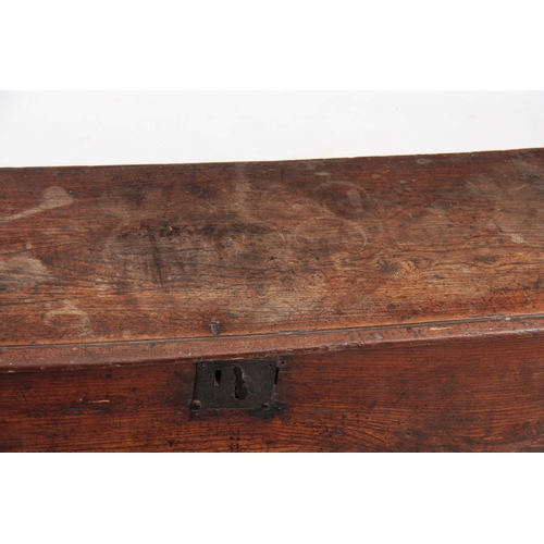 1244 - AN 18TH CENTURY ELM SIX PLANK SWORD BOX with hinged lid and iron-bound lock; standing on shaped end ... 