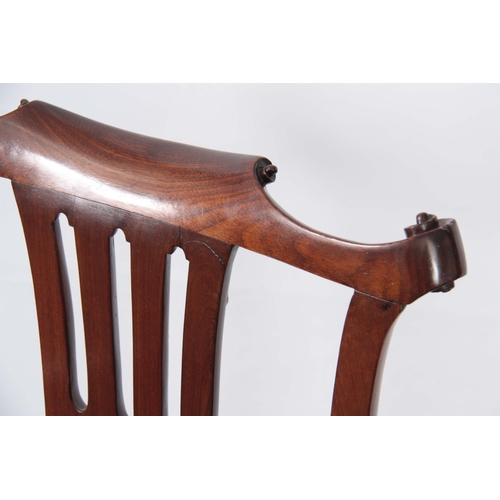 1245 - AN EARLY GEORGE III FIGURED MAHOGANY ARMCHAIR OF GENEROUS PROPORTIONS with shaped top rail and scrol... 