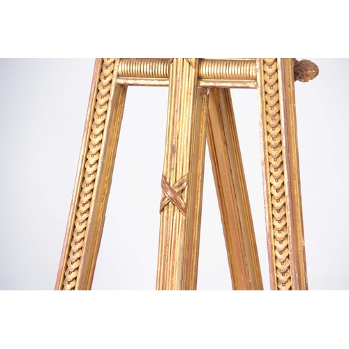 1246 - A WILLIAM IV CARVED GILT GESSO LIAR SHAPED EASEL with adjustable sliding rest and hinged back suppor... 