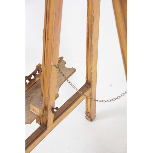 1246 - A WILLIAM IV CARVED GILT GESSO LIAR SHAPED EASEL with adjustable sliding rest and hinged back suppor... 