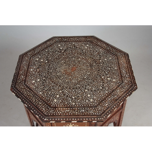 1257 - A 19TH CENTURY OCTAGONAL ANGLO INDIAN OCCASIONAL TABLE INLAID WITH BONE AND EBONY standing on a fold... 