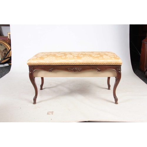 1264 - A 19TH CENTURY FRENCH CARVED BEECHWOOD PIANO STOOL with an upholstered hinged top revealing a compar... 