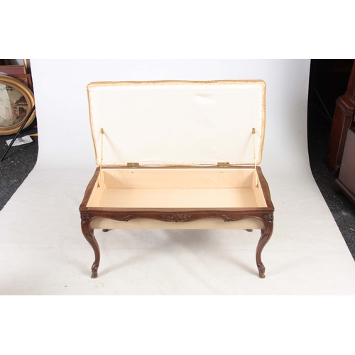 1264 - A 19TH CENTURY FRENCH CARVED BEECHWOOD PIANO STOOL with an upholstered hinged top revealing a compar... 