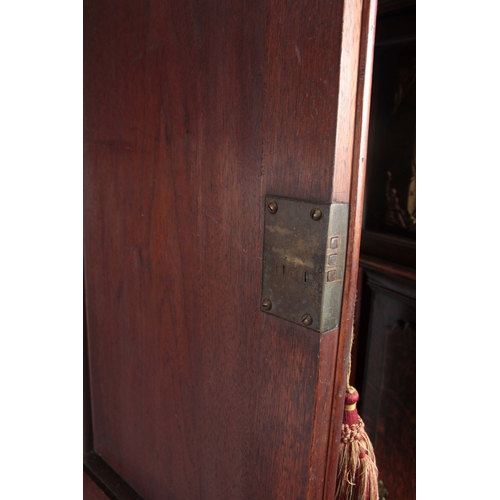 1267 - A WILLIAM AND MARY WALNUT BUREAU BOOKCASE the double-domed top with fielded panelled doors revealing... 