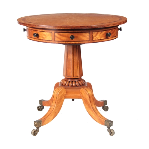 1268 - AN UNUSUAL ROSEWOOD CROSS-BANDED FIGURED SATINWOOD DRUM TABLE IN THE MANER OF GILLOWS having an over... 