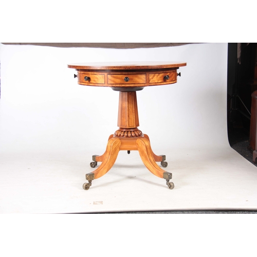 1268 - AN UNUSUAL ROSEWOOD CROSS-BANDED FIGURED SATINWOOD DRUM TABLE IN THE MANER OF GILLOWS having an over... 