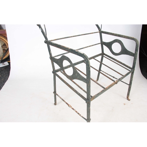 1273 - A REGENCY CAST IRON BENCH having a reclining back joined by shaped slats and decorated with scrolled... 