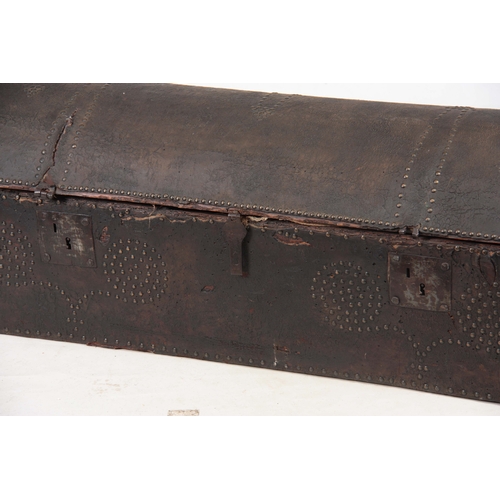 1274 - AN 18TH CENTURY DOME TOPPED LEATHER STUDDED TRUNK with hinged lid and side carrying handles 102cm wi... 