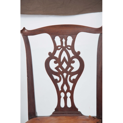 1292 - A PAIR OF GEORGE III MAHOGANY CHIPPENDALE STYLE SIDE CHAIRS with scrolled fold-over corners above  v... 