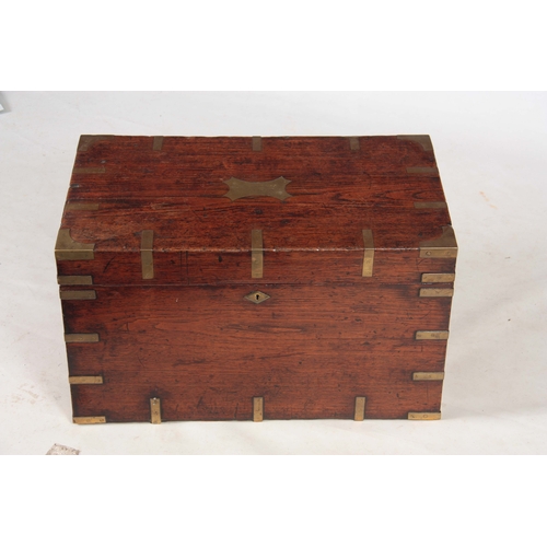 1294 - AN 18TH CENTURY CAMPHORWOOD OFFICERS TRUNK with brass corners, strapwork and fitted side handles; wi... 