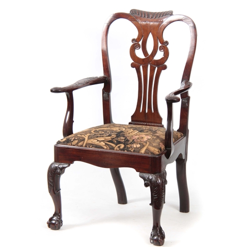 1299 - A GOOD GEORGE II MAHOGANY IRISH OPEN ARMCHAIR with shaped gadrooned top rail above a scrolled back s... 