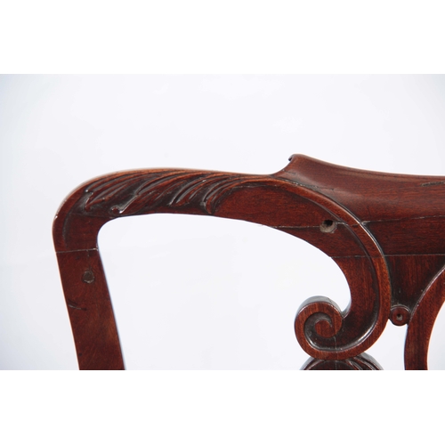 1300 - A GEORGE III CHIPPENDALE STYLE MAHOGANY OPEN ARMCHAIR with scrolled, leaf carved, pierced back splat... 