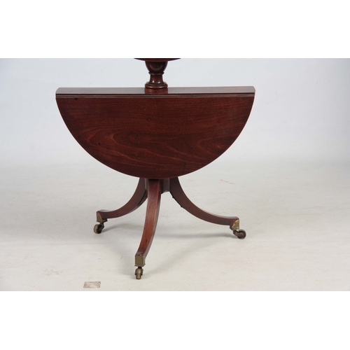 1301 - A GEORGE III MAHOGANY TWO TEIR FOLDING DUMB WAITER IN THE MANER OF GILLOWS having two circular shelv... 