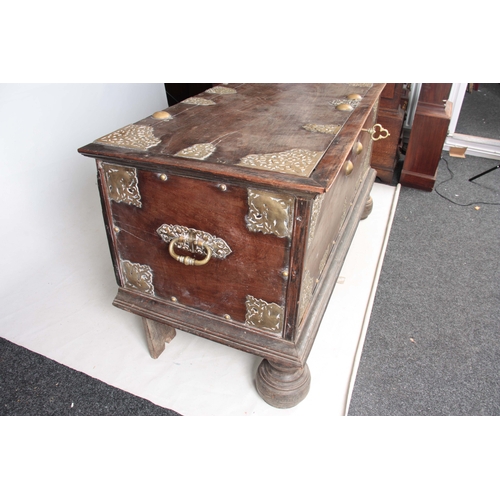 1302 - AN 18TH CENTURY ANGLO INDIAN BRASS MOUNTED HARDWOOD CHEST ON STAND with elaborate engraved pierced b... 