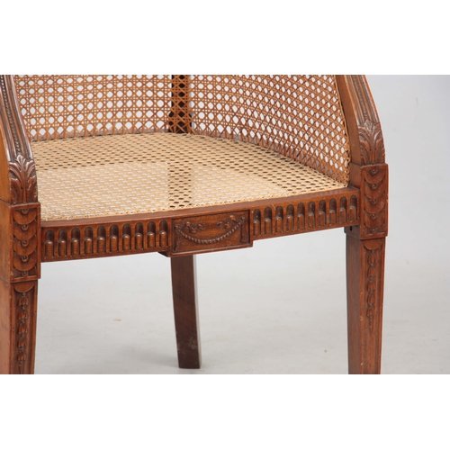 1303 - A LATE 19TH CENTURY ADAM STYLE BERGERE CHAIR with arcaded shaped back and rams head arms above leaf ... 