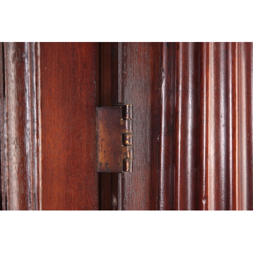 1306 - AN IMPRESSIVE 18TH CENTURY ARCHITECTURAL OAK HALL CUPBOARD with fluted corinthian side columns, hing... 