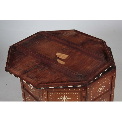 1257 - A 19TH CENTURY OCTAGONAL ANGLO INDIAN OCCASIONAL TABLE INLAID WITH BONE AND EBONY standing on a fold... 