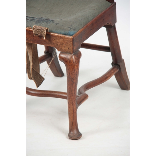 1310 - A GEORGE I WALNUT SINGLE CHAIR with angled shaped back and central splat above a drop-in seat; stand... 