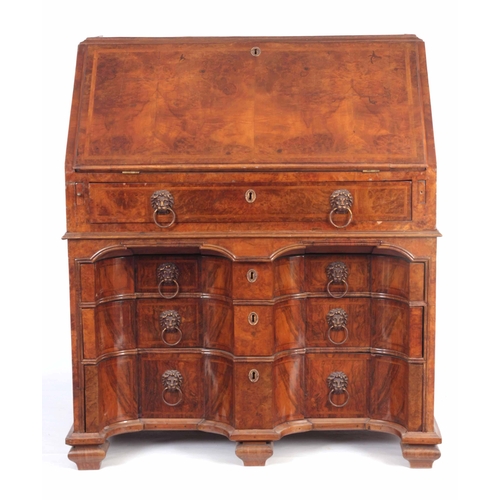 1311 - AN UNUSUAL LATE 17TH CENTURY TWO SECTIONAL BURR WALNUT BUREAU with double shaped kneehole to the fro... 