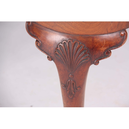 1313 - A 19TH CENTURY GEORGE I STYLE WALNUT CORNER CHAIR with carved eagles head top rail above solid shape... 