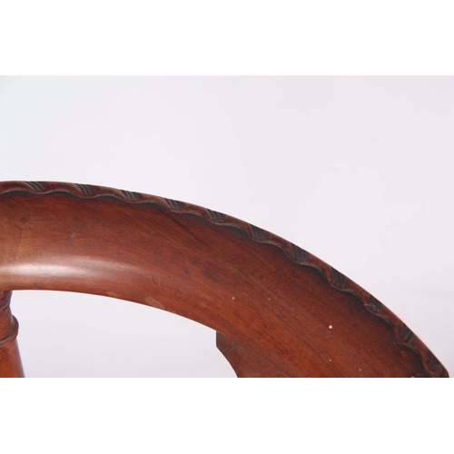 1313 - A 19TH CENTURY GEORGE I STYLE WALNUT CORNER CHAIR with carved eagles head top rail above solid shape... 