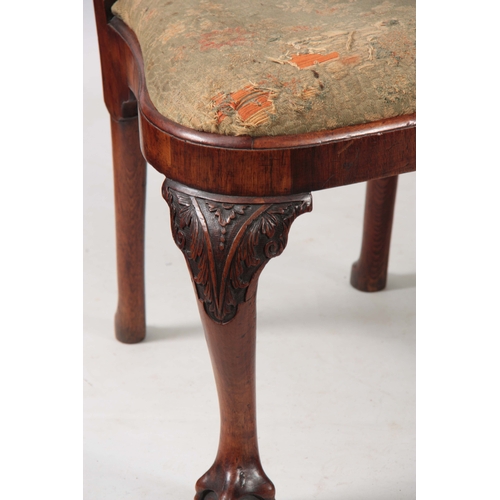 1319 - A PAIR OF GEORGE I WALNUT SIDE CHAIRS with shaped backs and drop-in seats; standing on carved cabrio... 