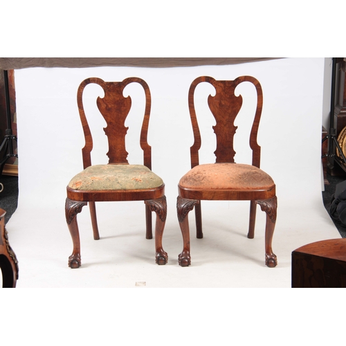 1319 - A PAIR OF GEORGE I WALNUT SIDE CHAIRS with shaped backs and drop-in seats; standing on carved cabrio... 