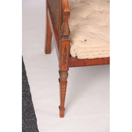 1320 - A 19TH CENTURY ADAM STYLE PAINTED SATINWOOD BERGERE THREE SEATER SETTEE with painted floral urns - b... 