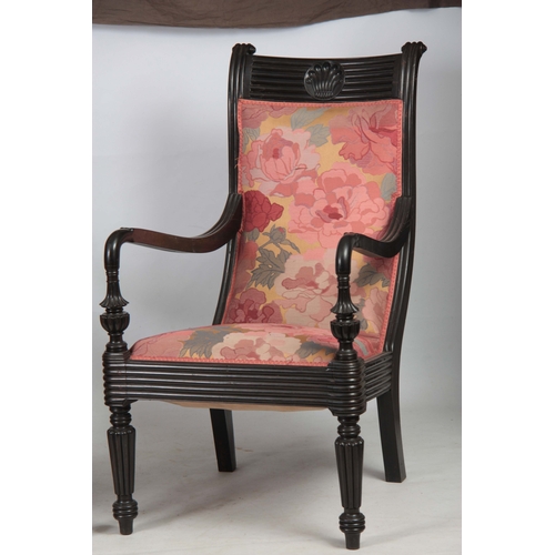 1328 - A PAIR OF 19TH CENTURY SOLID EBONY ANGLO INDIAN ARMCHAIRS with reeded shell carved back joined by sh... 