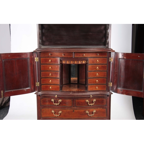 1331 - AN UNUSUAL SERPENTINE THREE TIER CABINET ON CHEST IN MANNER OF CHIPPENDALE with a two-tier fret cut ... 