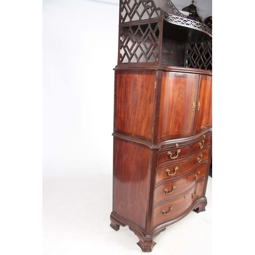 1331 - AN UNUSUAL SERPENTINE THREE TIER CABINET ON CHEST IN MANNER OF CHIPPENDALE with a two-tier fret cut ... 