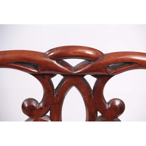 1333 - A FINE PAIR OF MID 18TH CENTURY AND TWO LATER MAHOGANY DINING CHAIRS IN THE MANNER OF THOMAS CHIPPEN... 