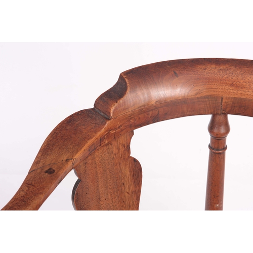 1334 - A MID 18TH CENTURY WALNUT CORNER CHAIR with vase shaped back splats, scrolled arms and turned suppor... 