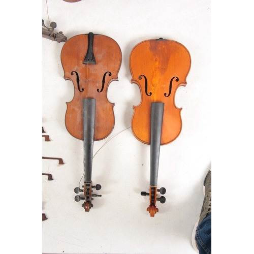 779 - A COLLECTION OF 7 VIOLINS AND 13 VIOLIN BOWS including a labelled Breton Brevete, length of back 35.... 