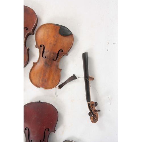 779 - A COLLECTION OF 7 VIOLINS AND 13 VIOLIN BOWS including a labelled Breton Brevete, length of back 35.... 