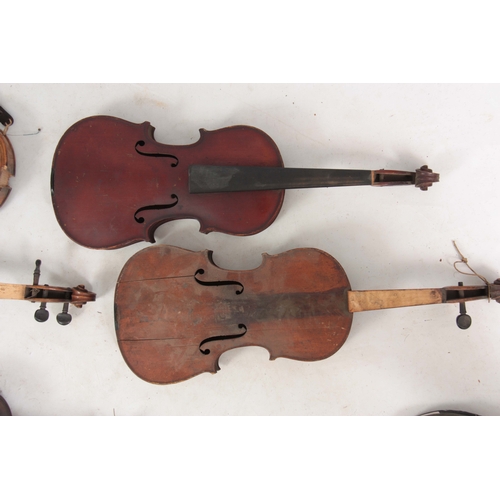 779 - A COLLECTION OF 7 VIOLINS AND 13 VIOLIN BOWS including a labelled Breton Brevete, length of back 35.... 