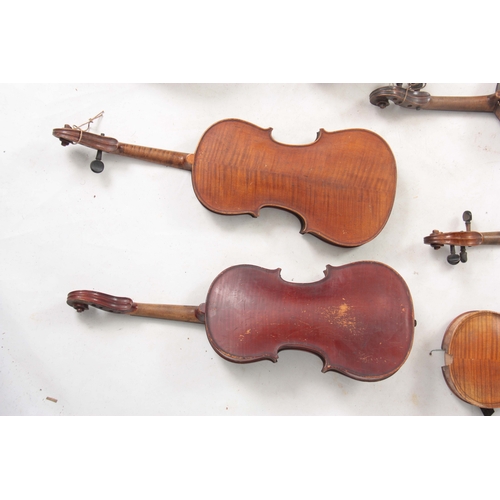 779 - A COLLECTION OF 7 VIOLINS AND 13 VIOLIN BOWS including a labelled Breton Brevete, length of back 35.... 