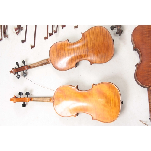 779 - A COLLECTION OF 7 VIOLINS AND 13 VIOLIN BOWS including a labelled Breton Brevete, length of back 35.... 