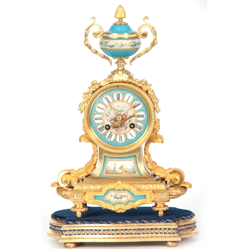 565 - A LATE 19TH CENTURY FRENCH ORMOLU AND PORCELAIN PANELLED MANTEL CLOCK the case surmounted by a flora... 