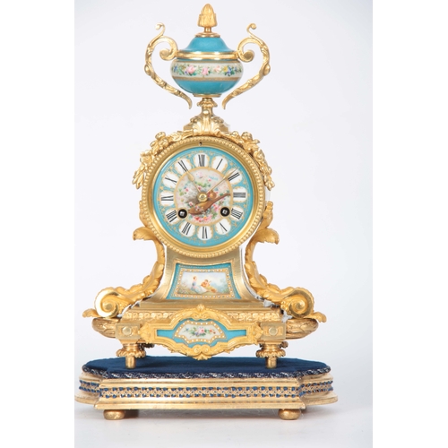565 - A LATE 19TH CENTURY FRENCH ORMOLU AND PORCELAIN PANELLED MANTEL CLOCK the case surmounted by a flora... 
